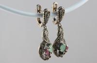 infinity sterling silver earrings with emerald, ruby, sapphire semi precious stones and marcasite